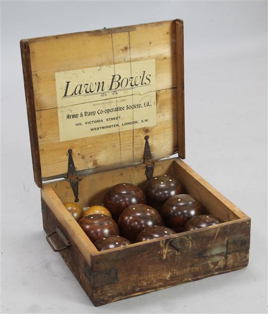 An early 20th century lawn bowls set,